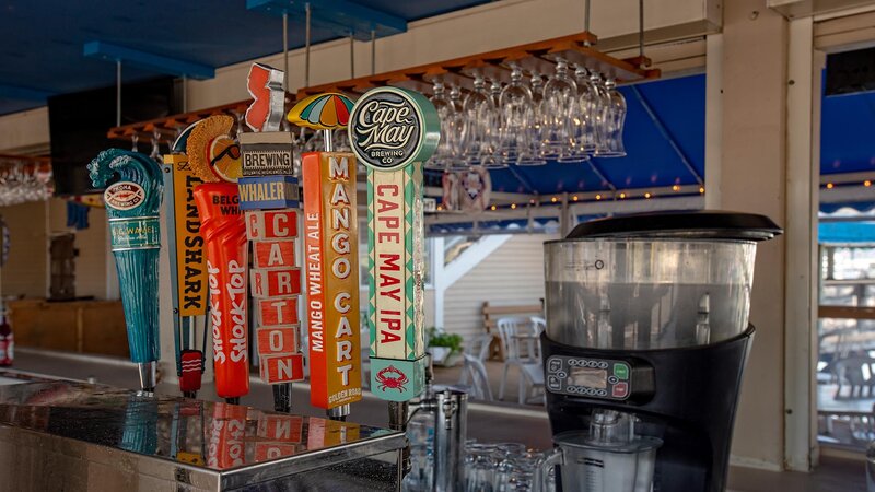 Outdoor bar with focus on beer taps